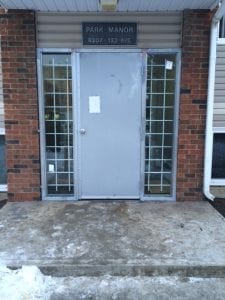 blue door on park manor ave